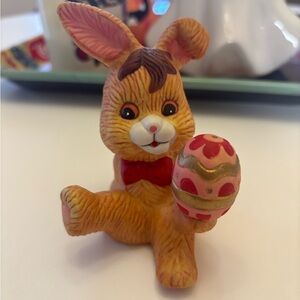 vintage bunny holding easter egg figurine